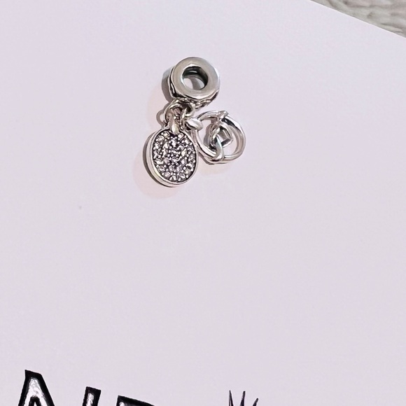 Authentic  Pandora knotted Hearts dangle charm - Picture 2 of 2